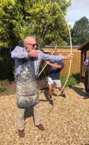 Pictured: A Bowyer’ Liveryman testing out their newly tillered Longbow