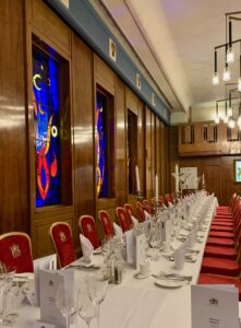 Dinner table and stained glass windows