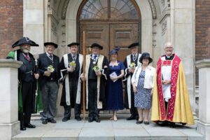 Persons gathered on church steps