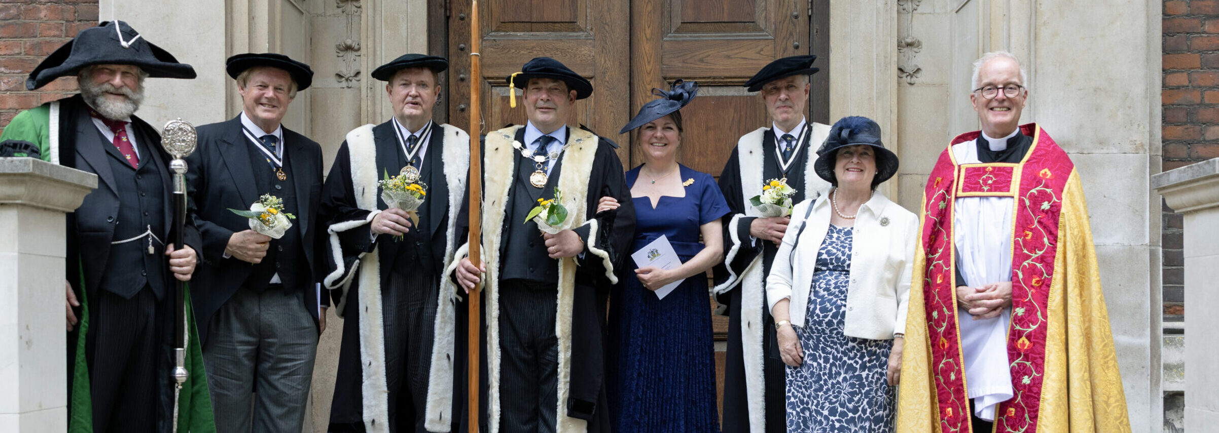 Members of Bowyers Company pictured in front of church door