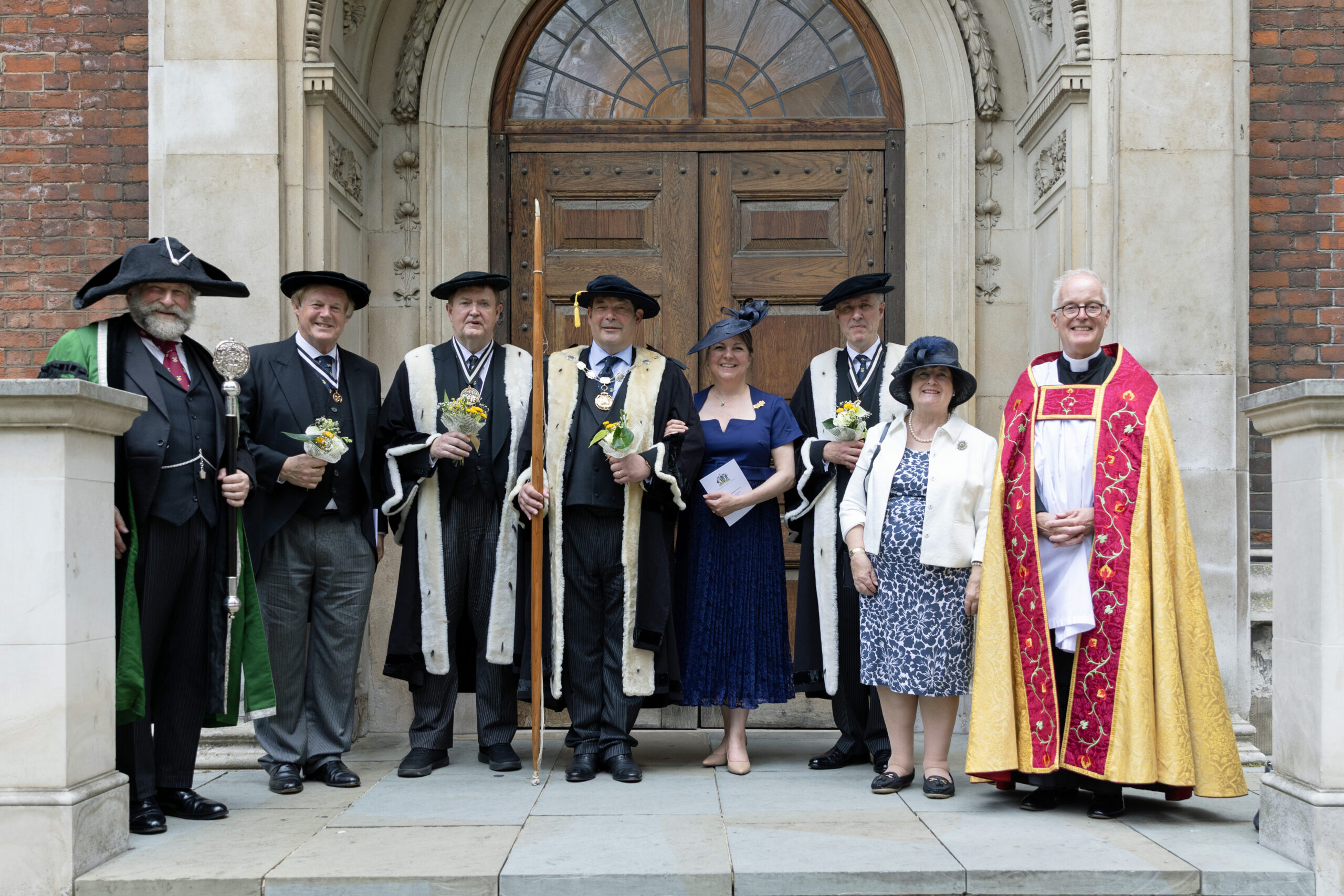 Members of Bowyers Company pictured in front of church door